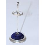 An Edwardian silver hat pin stand, with blue velvet pin-cushion, London, 1909