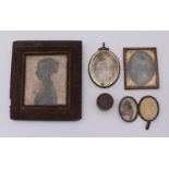 A late 18th /early 19th Century glazed oval portrait miniature/ memento-mori the front painted