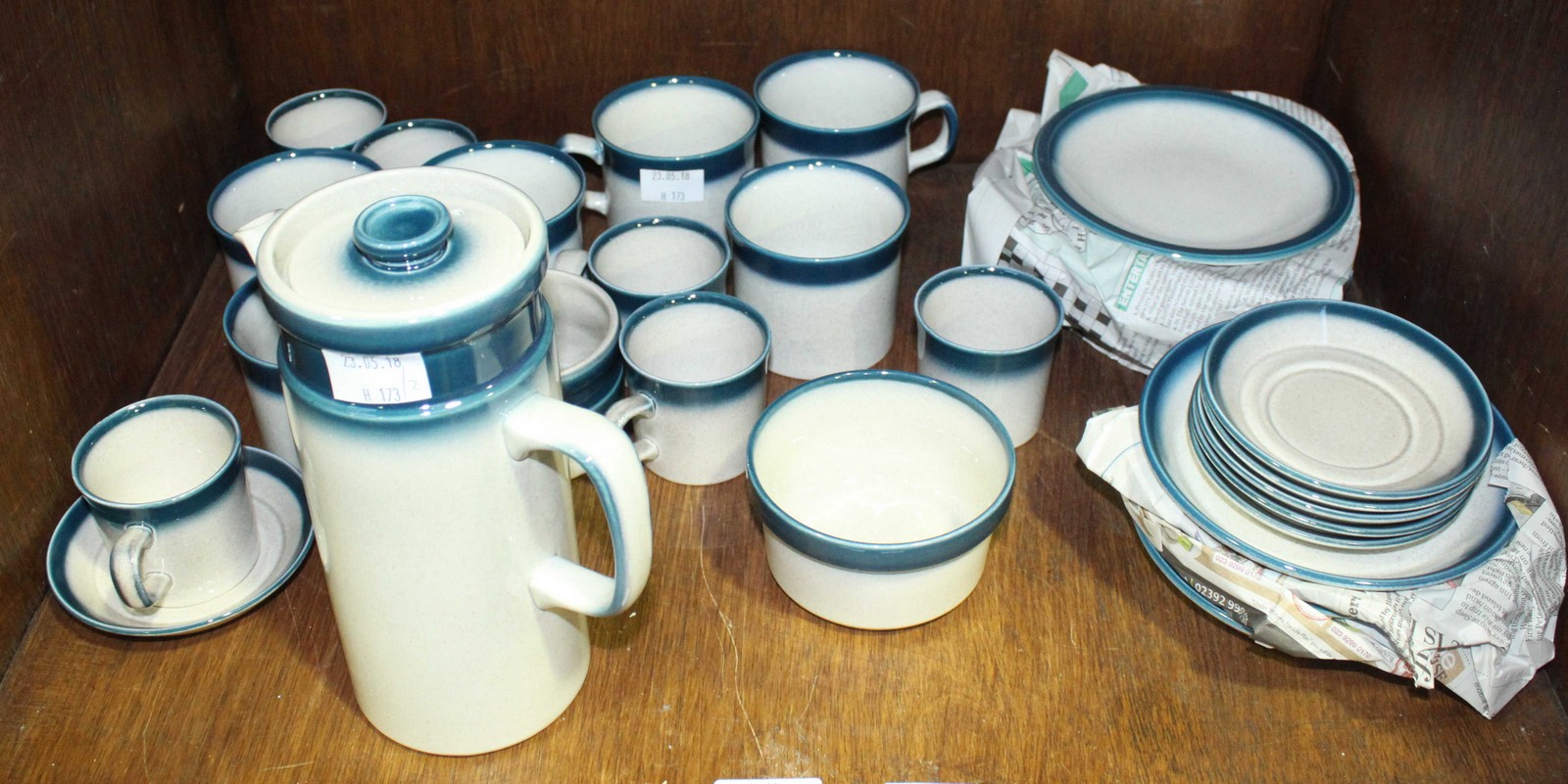 SECTION 34. A thirty-two piece Wedgwood ceramic 'Blue Pacific' tea and coffee service comprising