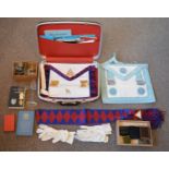 A quantity of Masonic regalia and literature contained within a purpose made briefcase, together