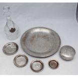 An Egyptian white-metal circular dish, 30cm, four small graduated pin dishes and a circular box