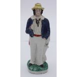 A 19th century Staffordshire pottery figure 'Soldier Sailor' modelled double-sided with a sailor and