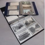 A collection of forty-five postcards spread across two albums, largely of topographical interest