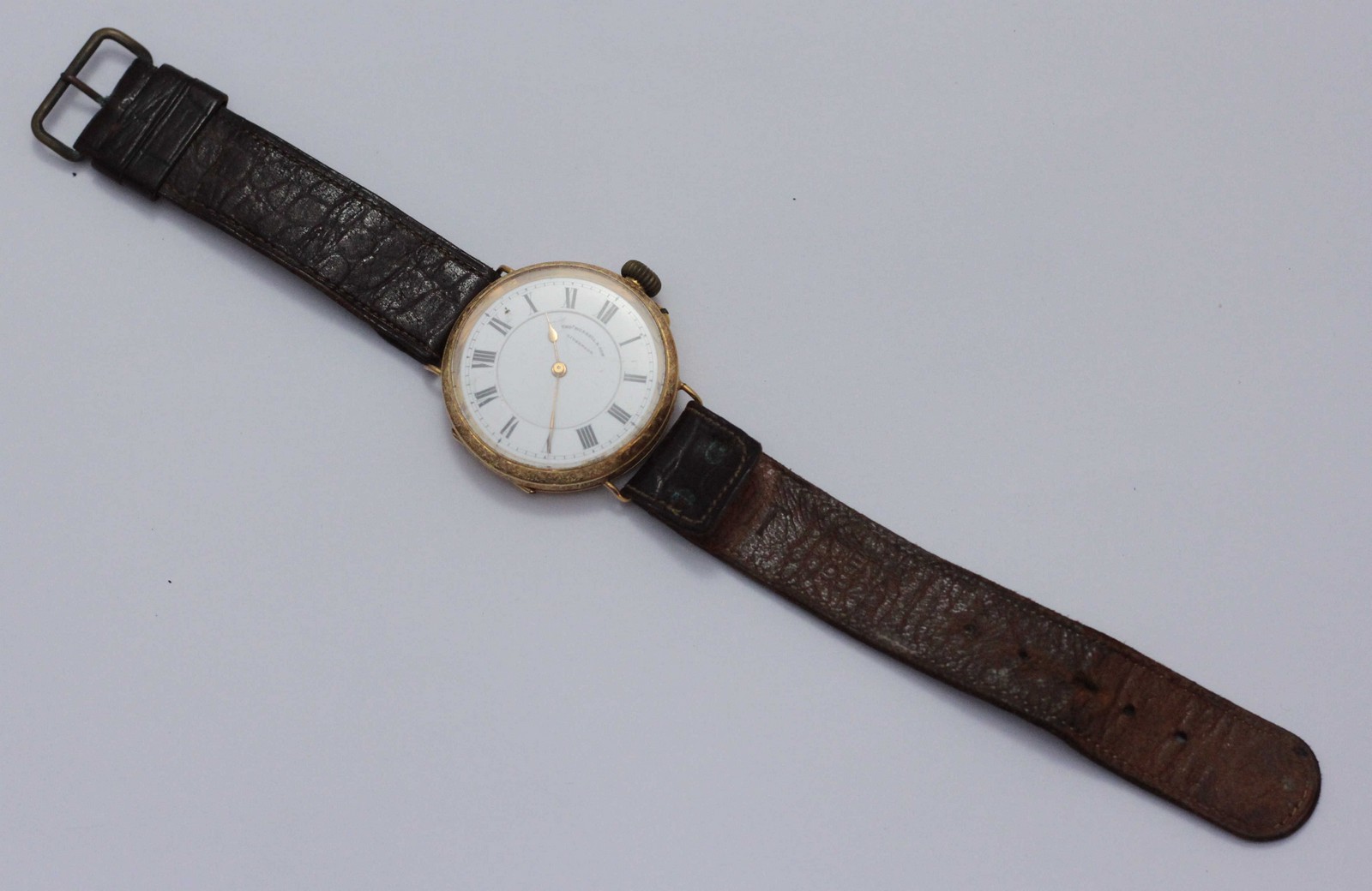 An 18ct gold cased wristwatch, possibly converted from a pocket watch with movement and face