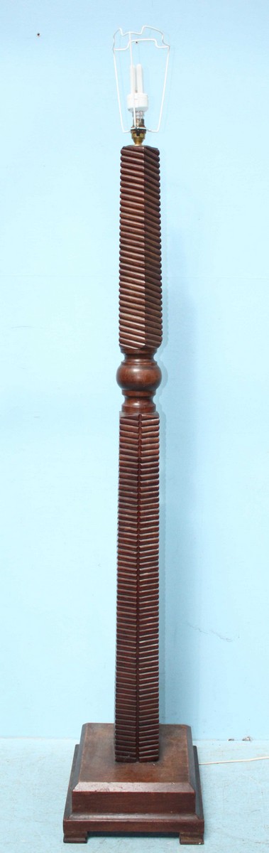 A hardwood standard lamp with horizontal reeded column