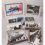 A collection of approximately fifty-five WW2 black & white press photographs from various theatres