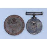 A bronze medallion '53rd Welsh Division Egypt 1918, minted in Cairo, (traces of original red