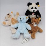 Four Steiff Teddy Bears including 'Paddy', 'Charly', a Panda and My First Steiff, all with yellow