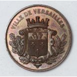 A 19th Century French Medallion,struck 'Ville De Versailles' above coat of arms, the reverse an