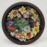 A Moorcroft Charger from the Carousel Centenary Collection after a design by Rachel Bishop,