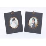 A pair of early 19th century oval portrait miniatures of a Royal Naval officer wearing epaulette'