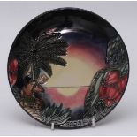 A Moorcroft pottery Year plate '2000' decorated with 'Birth of Light' pattern, limited edition 285/