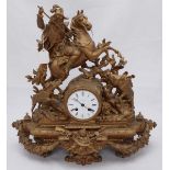 A 19th Century cast spelter figural mantel clock modelled as a medieval mounted-huntsman and two