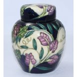 A Moorcroft pottery ginger jar and cover in the 'Tempest' pattern after Philip Gibson, signed, for