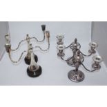 A pair of white metal Georgian style three-light candelabra with removable flame finials,