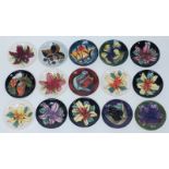 Fifteen various Moorcroft pottery pin dishes, various designs and marks, 4.5" /115mm diam (refer