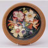 A limited edition Moorcroft pottery dish produced for the ERII Golden Jubilee, after a design by