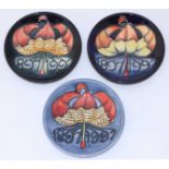 Three Moorcroft Centenary Pin Dishes 1897-1997, all copyright 1997, various decorator's monograms