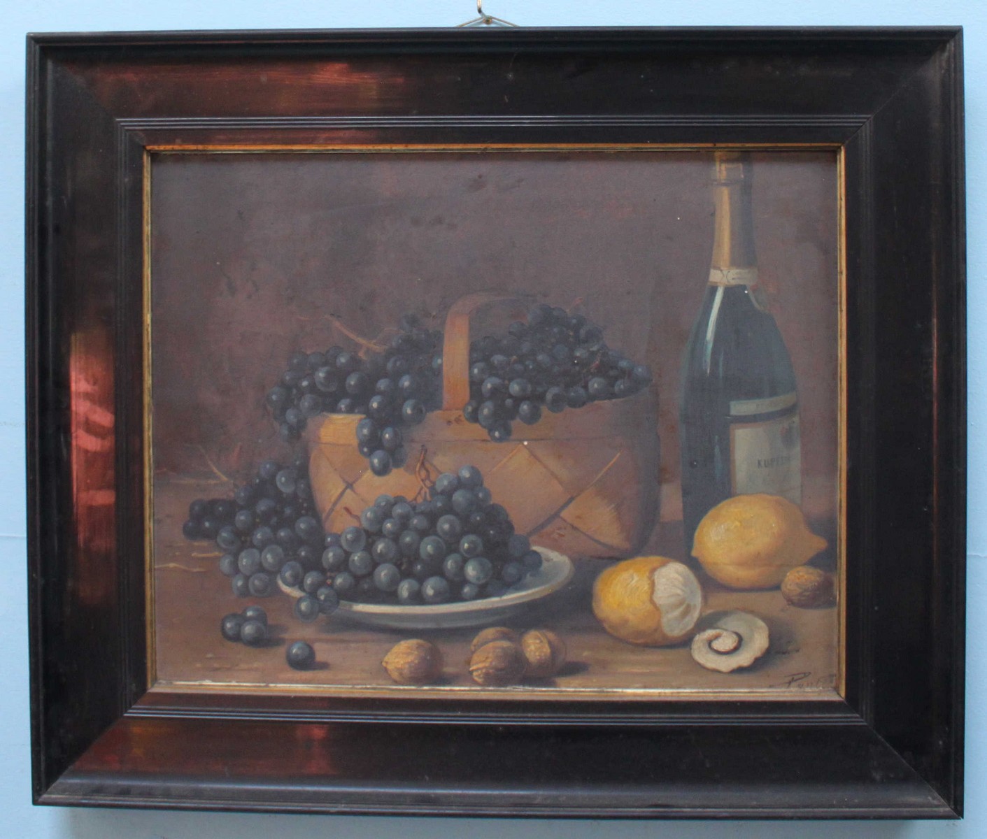 A late 19th /early 20th Century school, still life study of grapes and lemons with walnuts and wine,