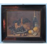 A late 19th /early 20th Century school, still life study of grapes and lemons with walnuts and wine,