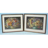 A pair of early 20th century floral still life studies of a vase & flowers, unsigned, pastel on