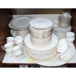 SECTION 11. A 97-piece Royal Albert 'Val D'or' pattern tea and dinner service comprising of cups,