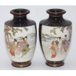 A pair of Japanese Satsuma pottery vases painted with Geisha Girls and flowers to cream reserves and