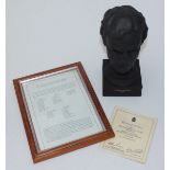 A Wedgwood black basalt bust of Lester Piggott, limited edition number 171/500, raised on a square