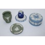 A Jasperware 'style' pottery match striker pot, together with three various items of Wedgwood