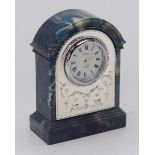 A small silver-mounted marbled-composite clock. 9cm high.