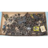 A collection of assorted Hornby Meccano 'O' gauge clockwork tinplate model railway track and a small