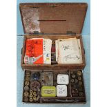 A wooden box containing a quantity of assorted Meccano and associated accessories.