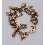 A 9ct gold charm bracelet with eighteen charms, gross weight approximately 32.29g