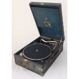 An HMV portable gramophone in blue vinyl case. Case measures 41.5cm long.