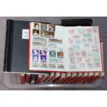 A collection of Polish stamps, mid 20th century onwards, used and in fifteen 26x20cm red vinyl stock