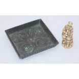 A Chinese bronze square dish with fluted outer edge and character marks to bottom and base,