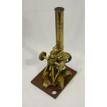 A Stanley microscope, brass L shaped stand inscribed with 'Stanley, Railway Approach, London