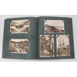 A collection of approximately 370 assorted postcards across two albums, one album of largely