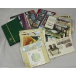 A small quantity of assorted Royal Mail mint stamps sets and a small collection of loose mounted