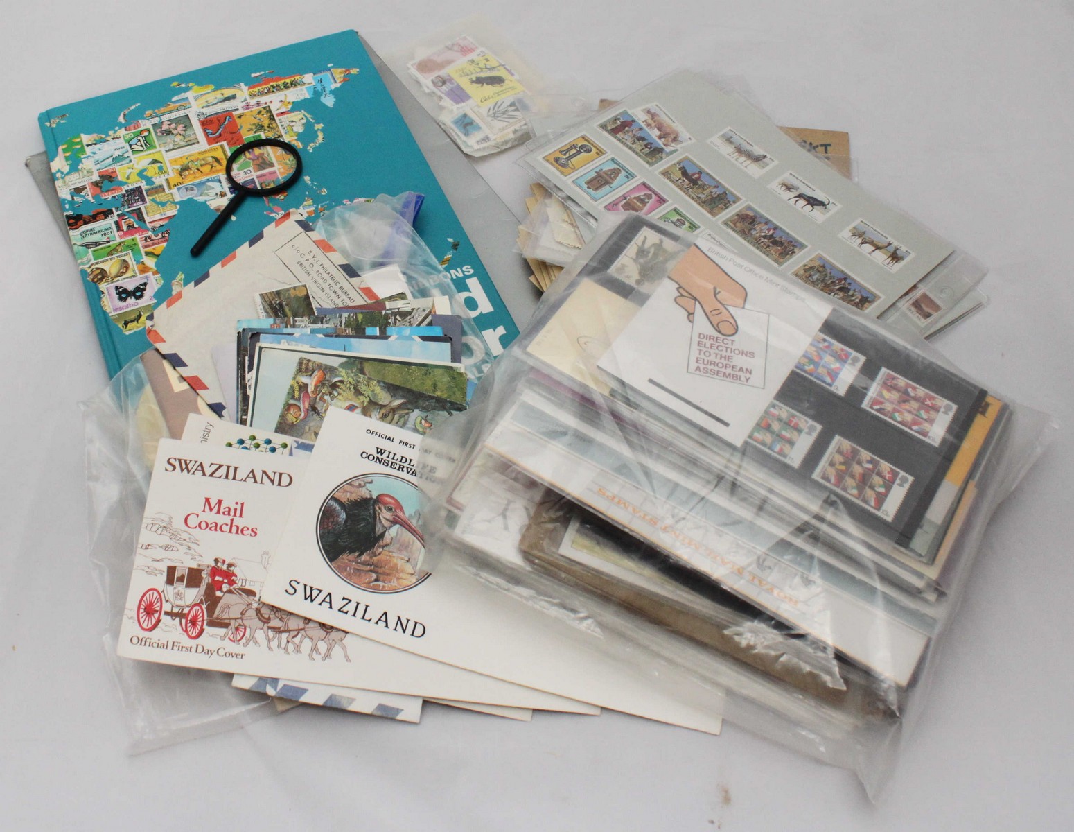 A small collection of Royal Mail mint stamps and other stamps, together with a small quantity of