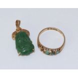 An 18ct gold pendant set with a jade coloured stone, together with an 18ct gold ring set with