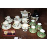 SECTION 38. A Minton part coffee set with silver mounts by Walker & Hall, two commemorative silver