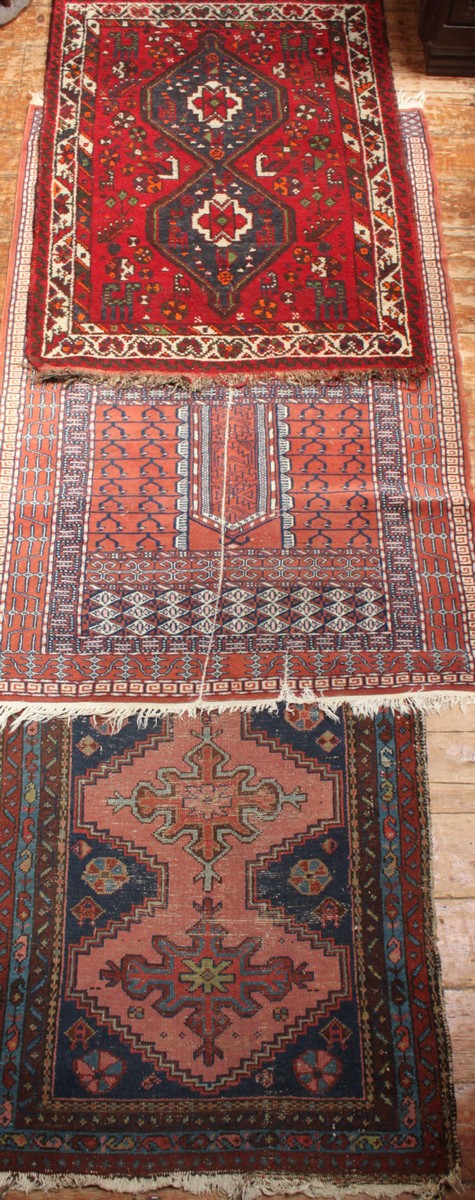 Three various hand-knotted Caucasian rugs, the largest 153x96cm (3)