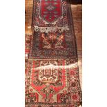 Three various hand-knotted Caucasian rugs, the largest 176x88cm (3)