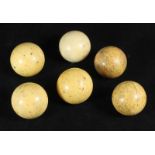 Six various early 20th century ivory billiard balls, largest ball measures approximately 5cm in