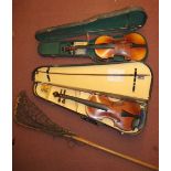 Two various violins in vinyl cases with bows, including one baring label for 'Joannes Baptista Guad