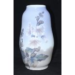A Royal Copenhagen porcelain vase decorated with flowers, pattern / shape 2549 / 1148, 29cm high
