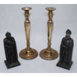 A pair of metal novelty table lighters modelled as knights in armour, approx. 25cm high, together