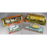 Four boxed Dinky vehicles comprising AEC Fuel Tanker Esso 945, Range Rover Ambulance 268, Air Sea