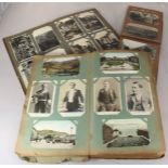 A collection of approximately 600 assorted postcards across three albums, of varying subject matter,